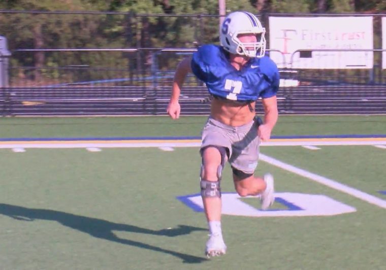 Dylan Smith returns to Sheridan football after severe ACL injury