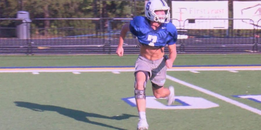 Dylan Smith returns to Sheridan football after severe ACL injury